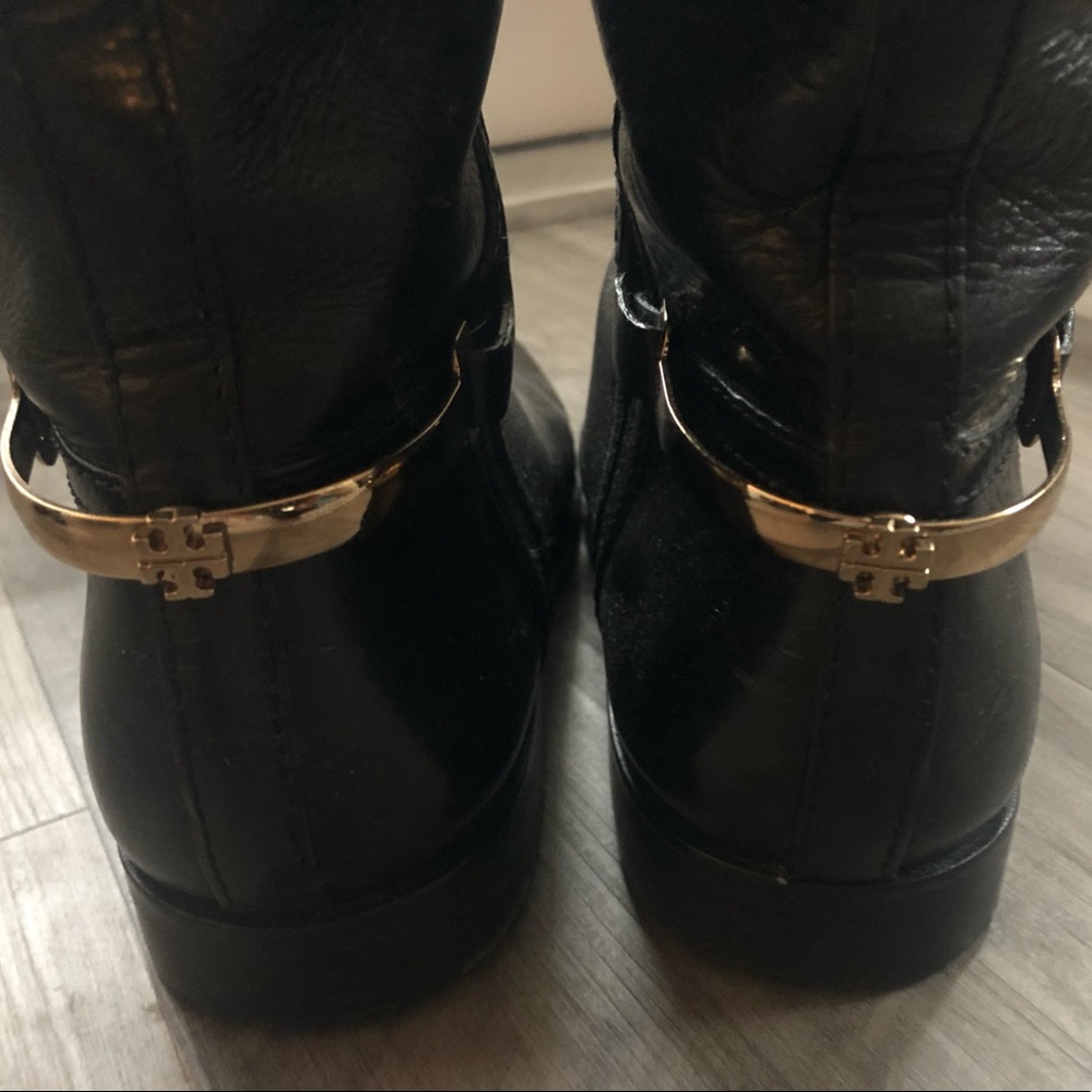 Tory Burch black riding boots.